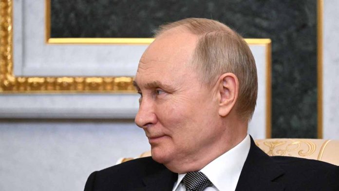 Exit polls show Putin to cement hardline rule after set-piece vote